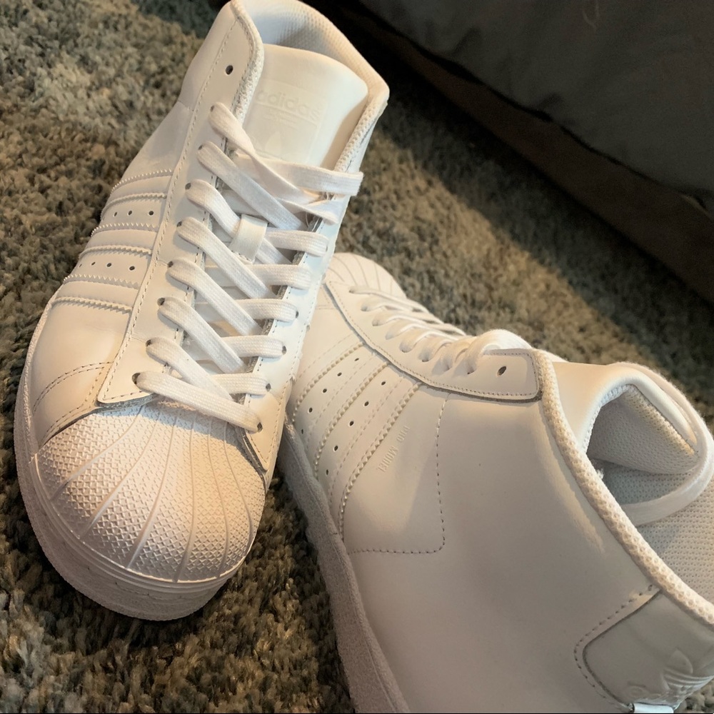 All white high top Adidas ! WORN ONCE !!